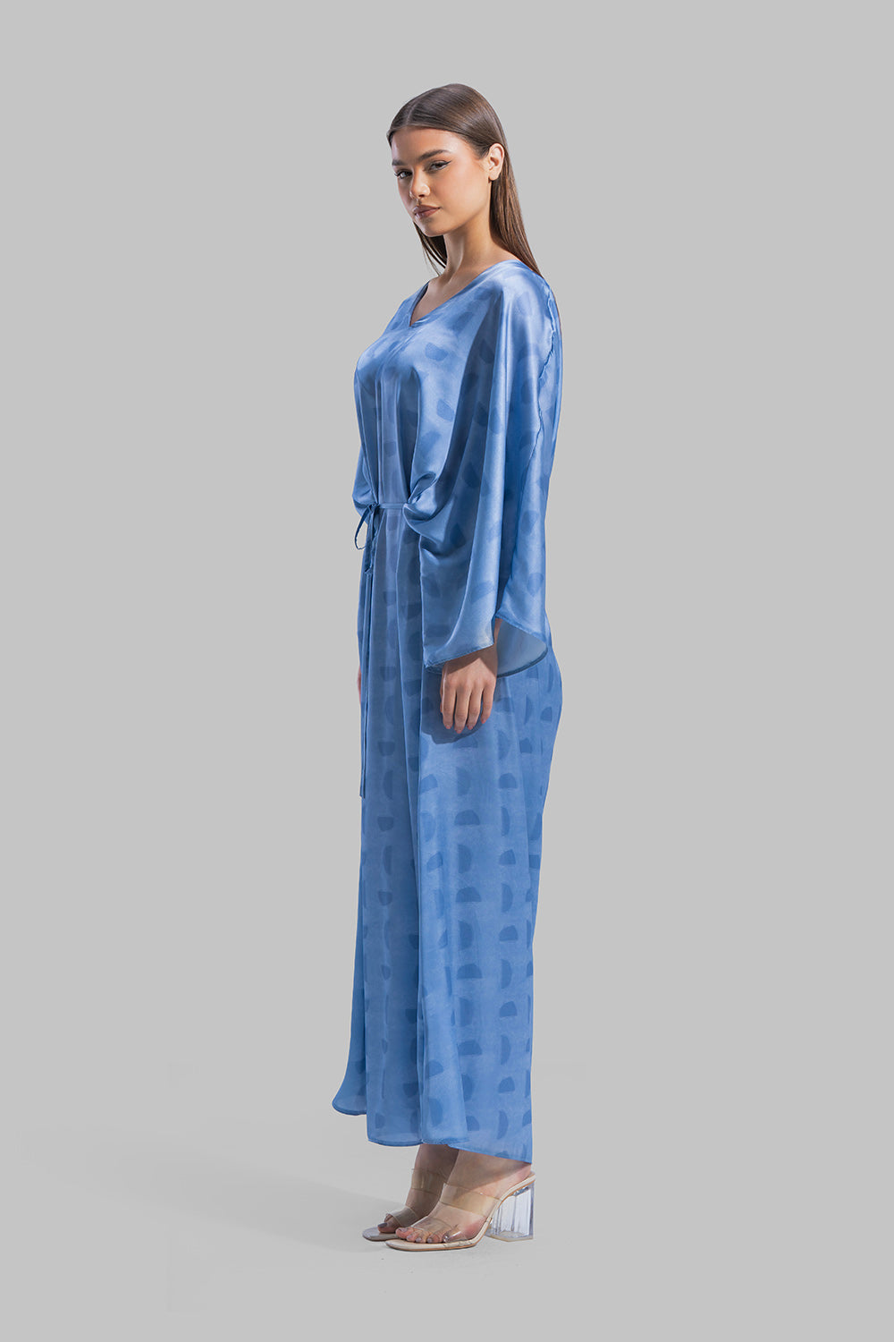 Oversized maxi dress featuring a V-neckline and wide kimono-style sleeves.