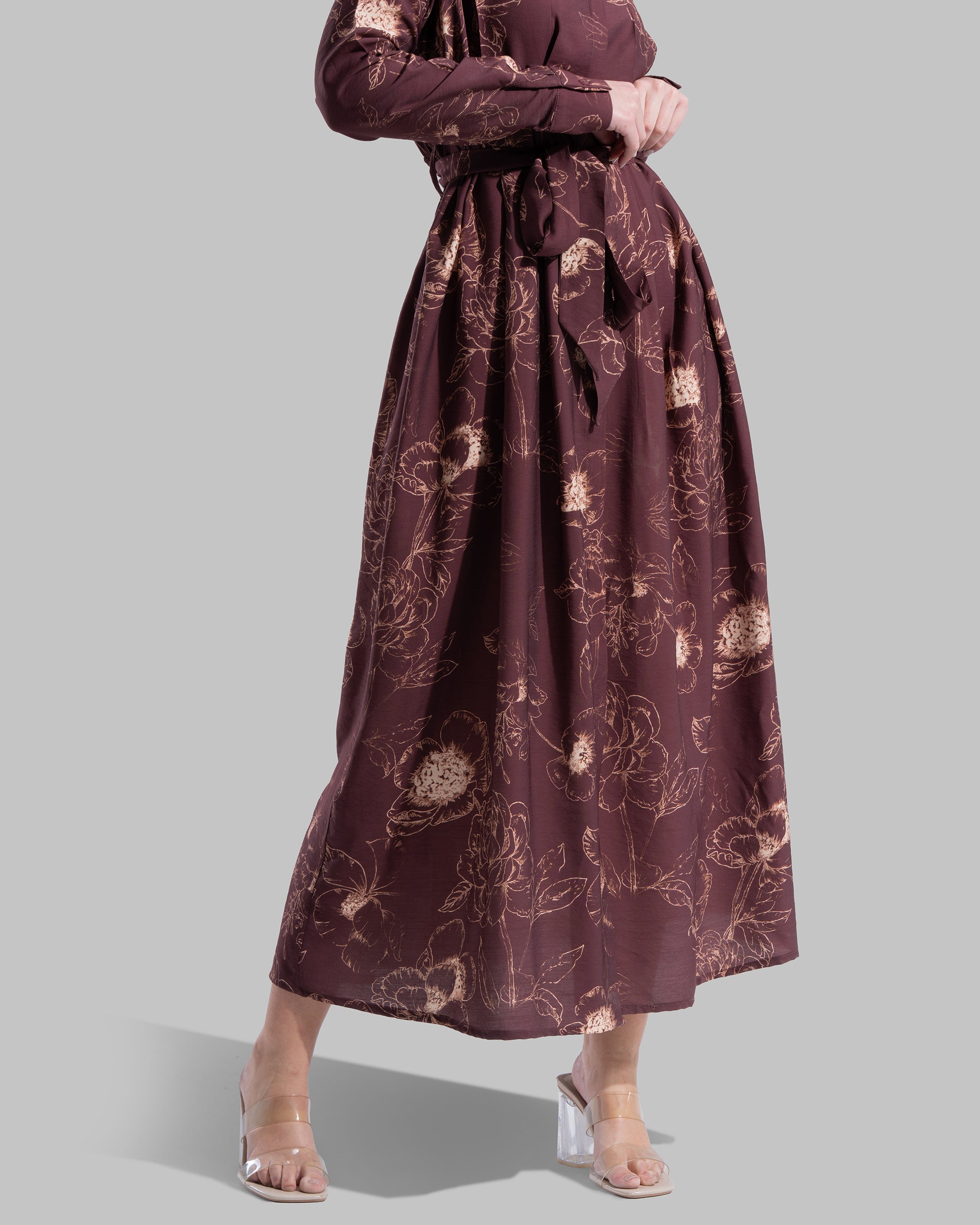 Floral print midi shirt dress with a matching tie belt at the waist.