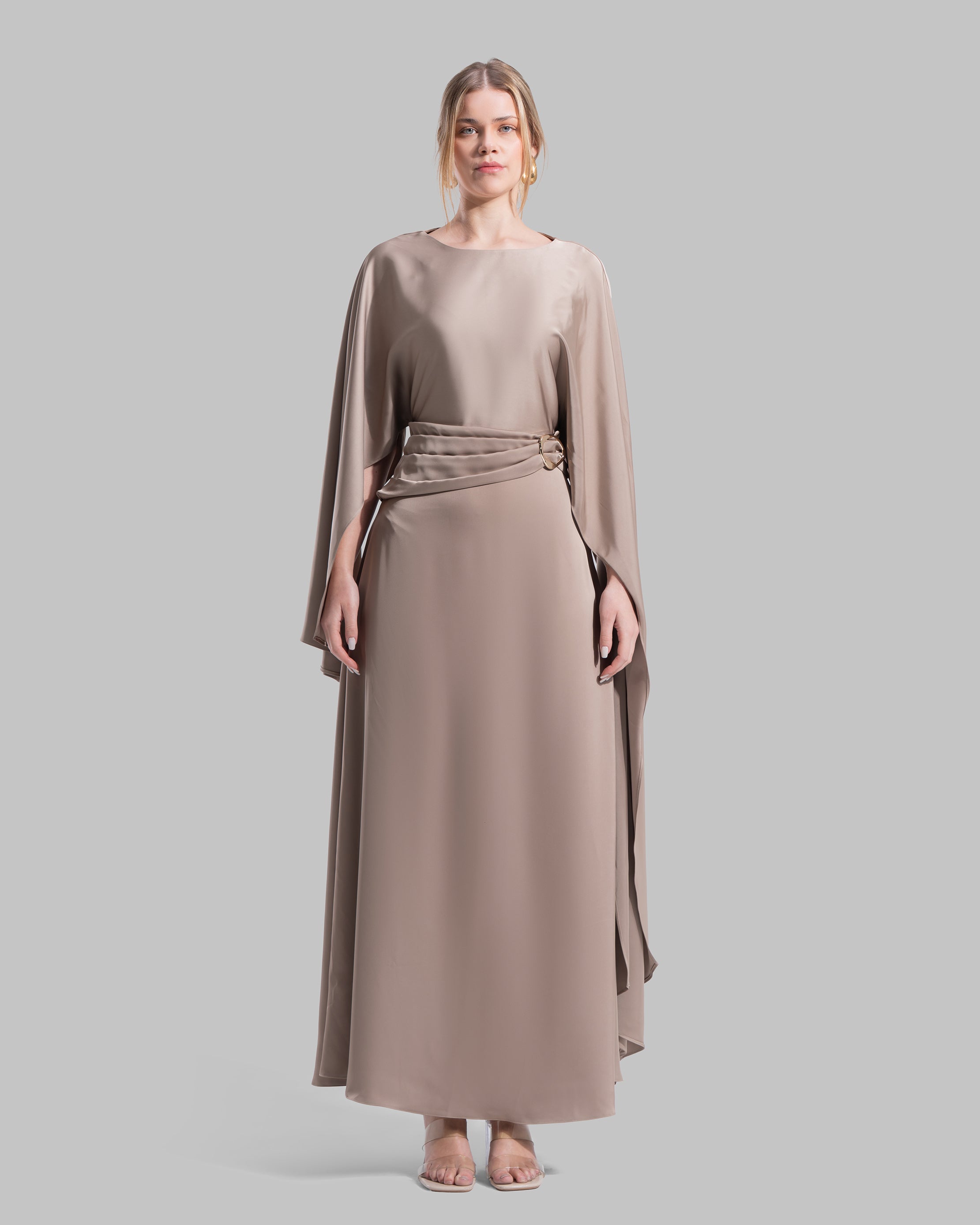 An elegant satin gown of sweeping length