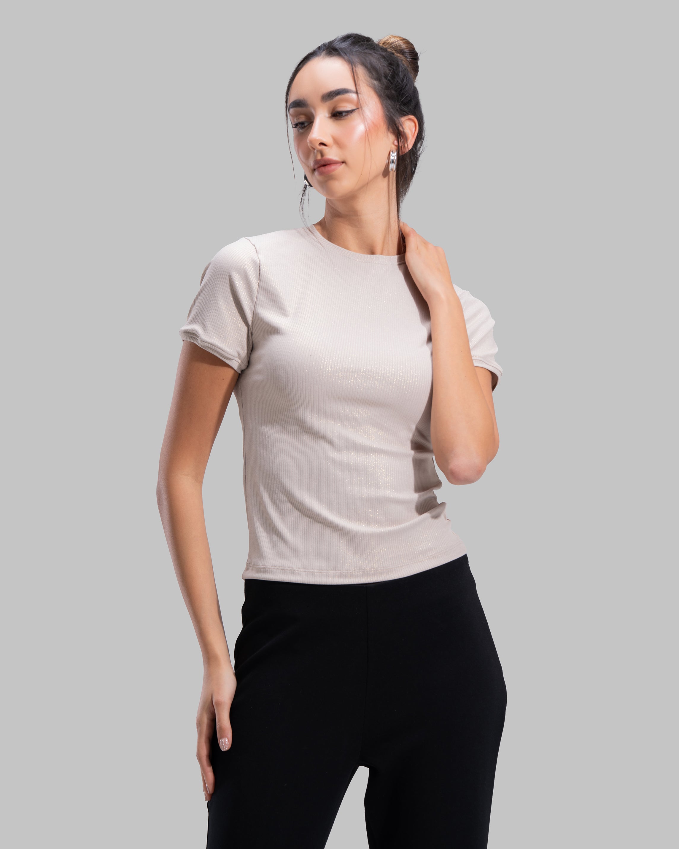 Short sleeve ribbed top with a shimmering metallic finish and round neck.