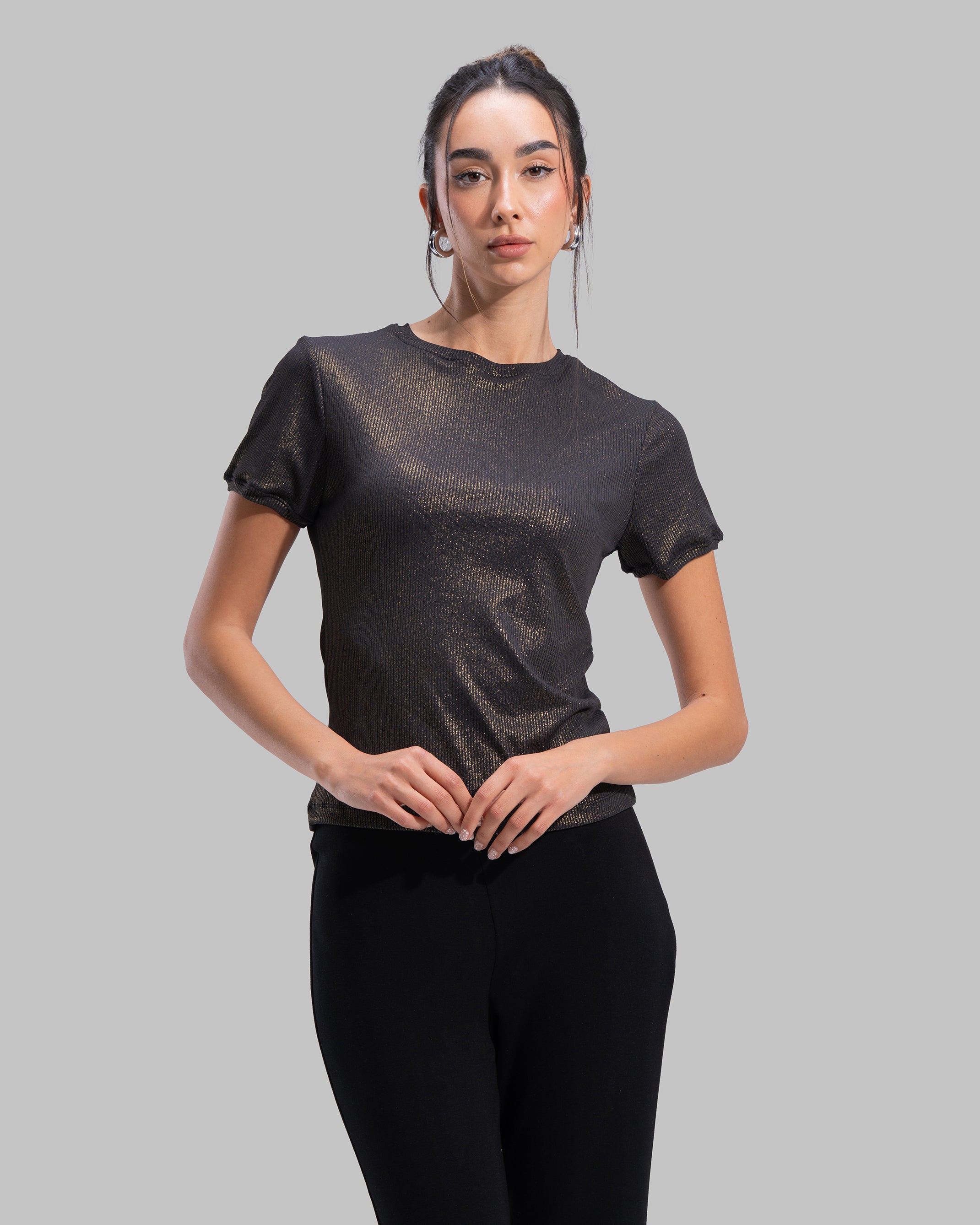 Short sleeve ribbed top with a shimmering metallic finish and round neck.