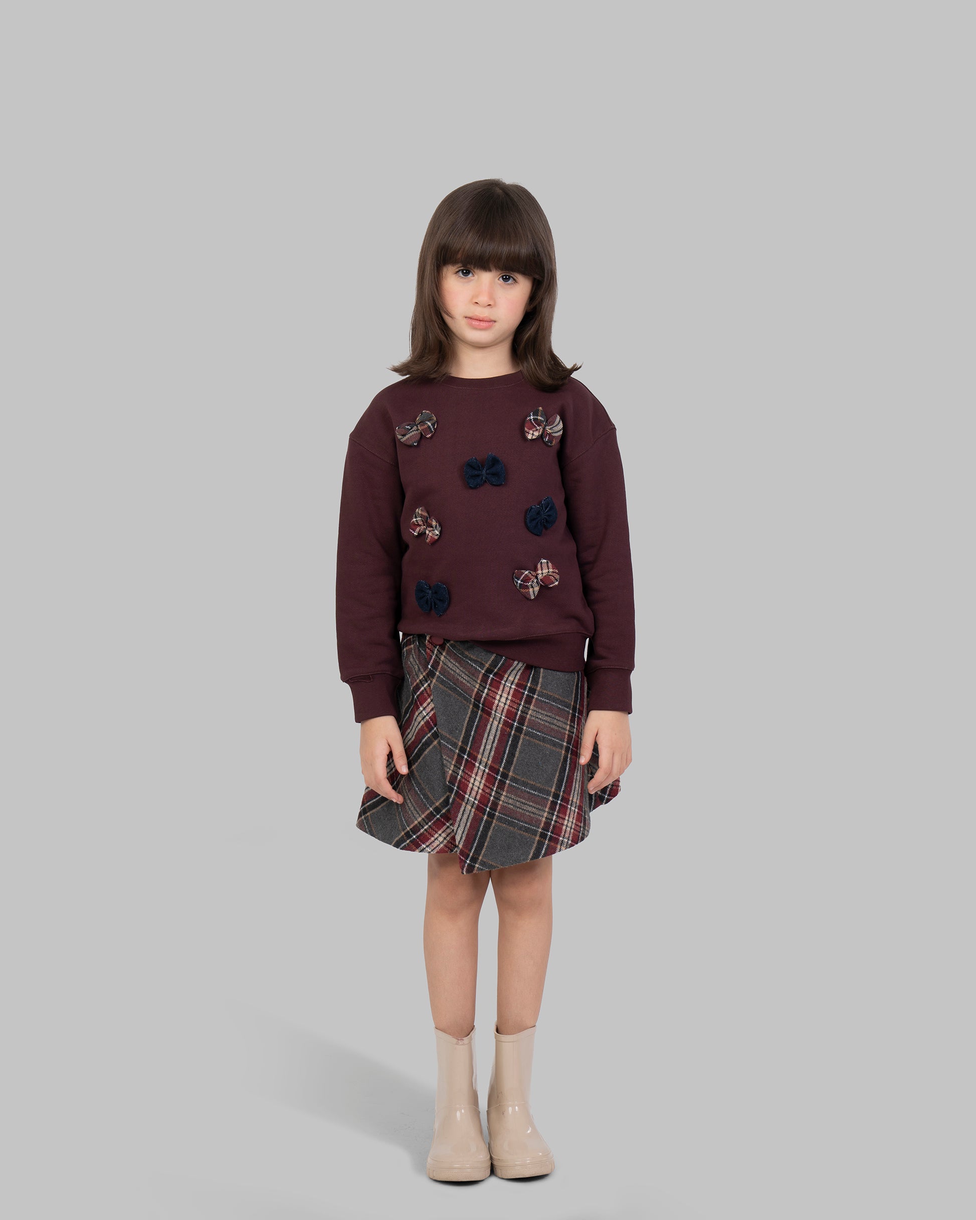 تنورة قصيرة ملفوفة من قماش كاروهات من مزيج الصوف