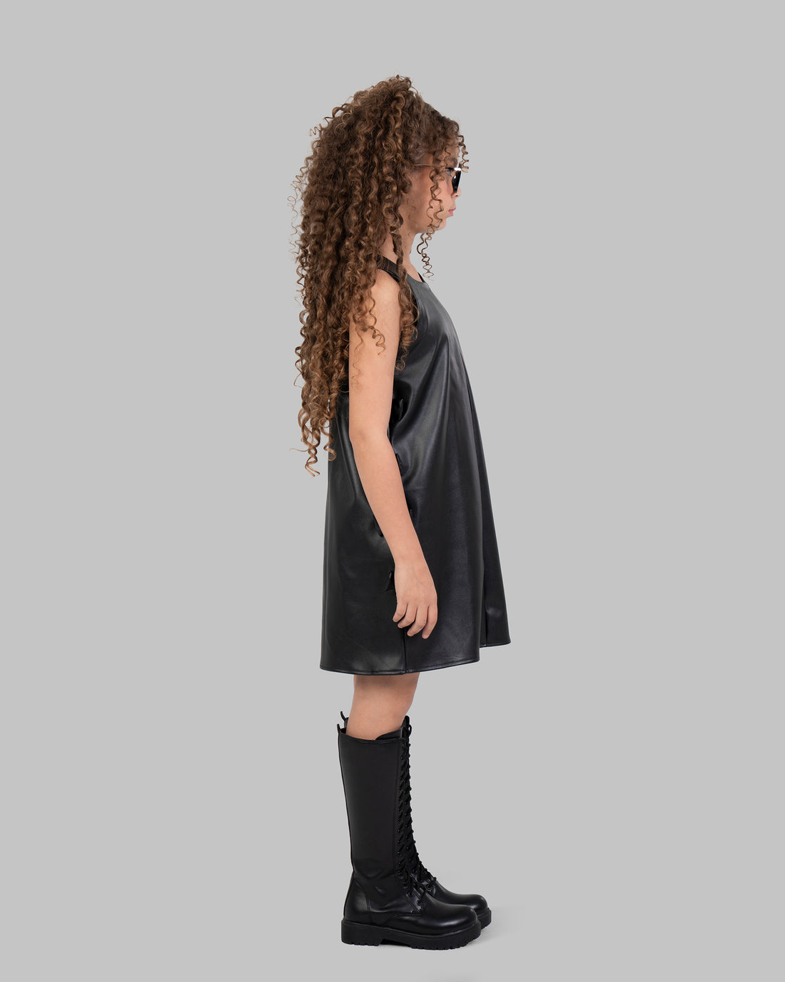 Leather Pinafore Dress with Side Bow Details.