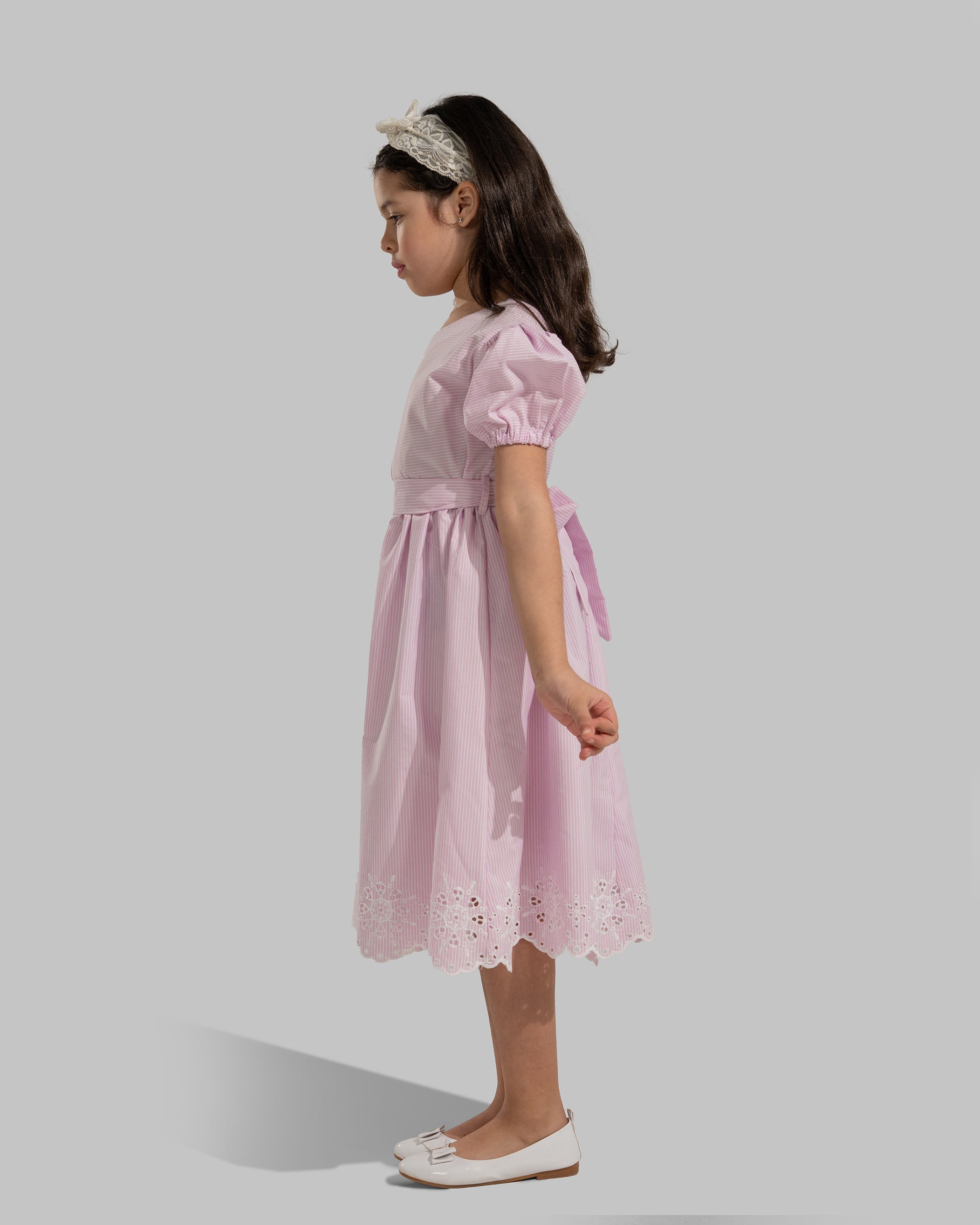 Striped puff-sleeve dress with a matching tie belt.