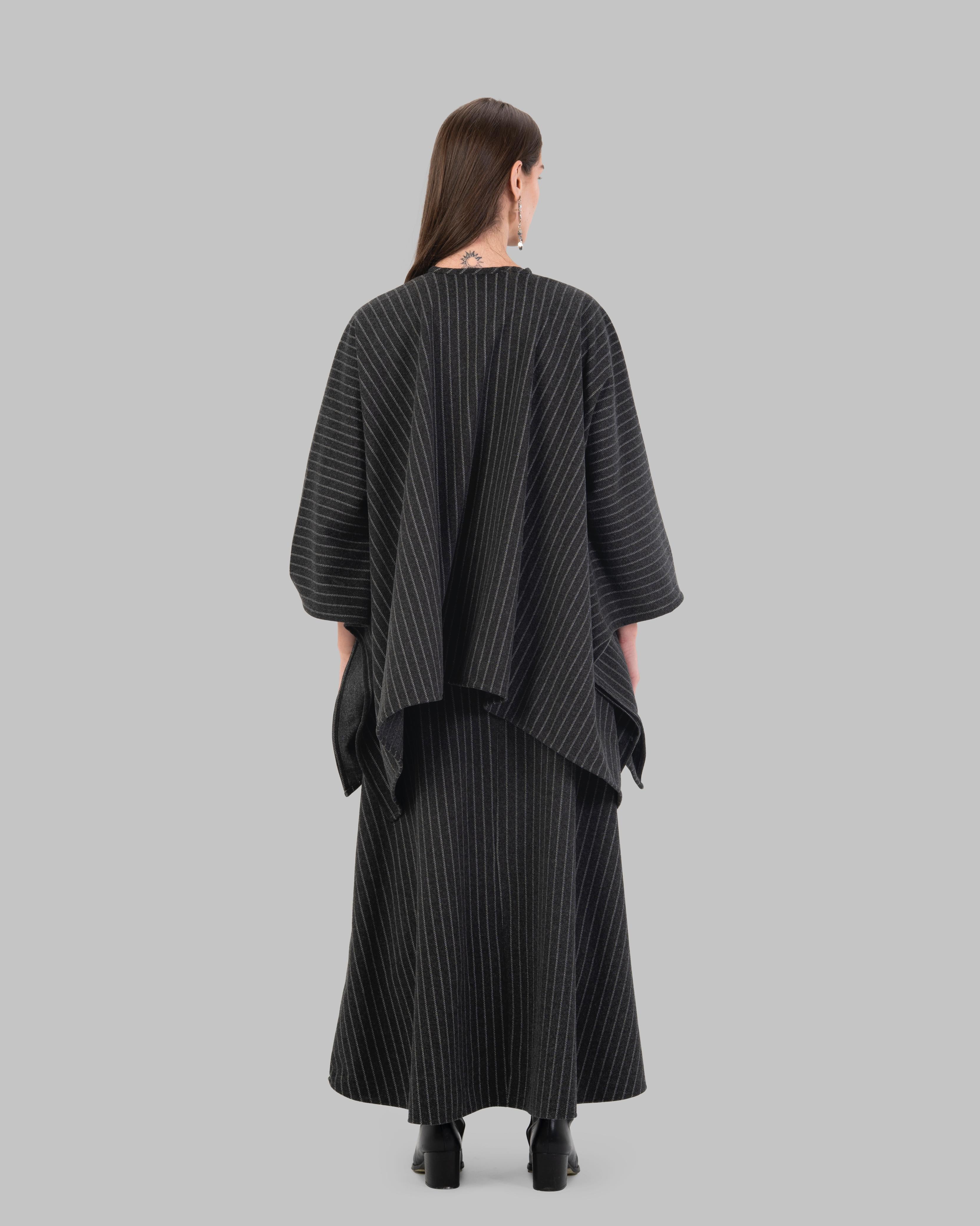 pinstripe poncho with a V-neck and an asymmetric hem.