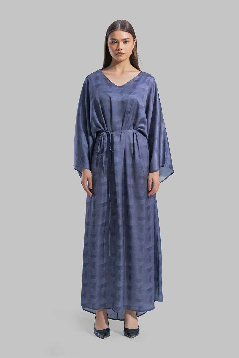 Oversized maxi dress featuring a V-neckline and wide kimono-style sleeves.