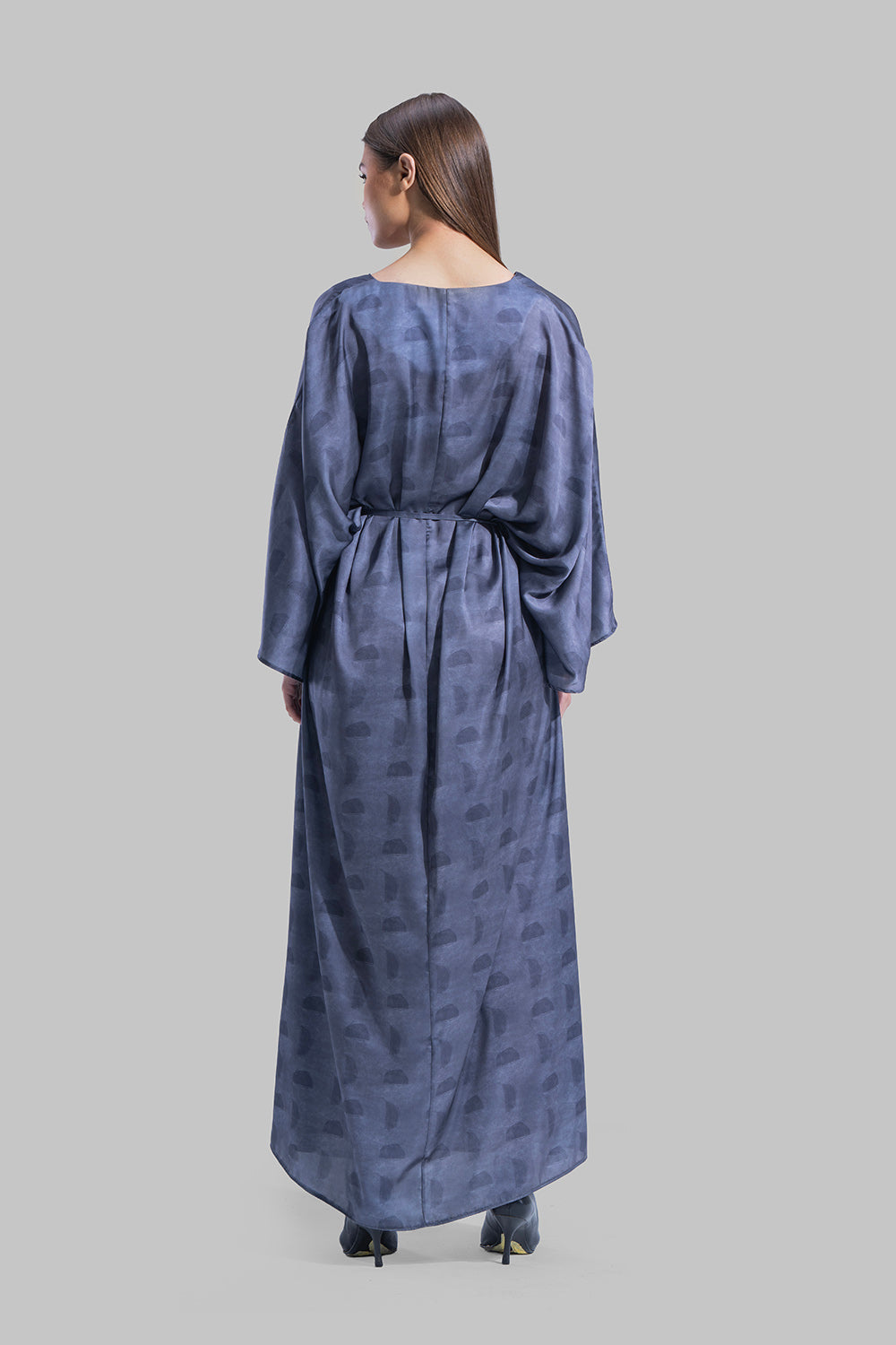 Oversized maxi dress featuring a V-neckline and wide kimono-style sleeves.