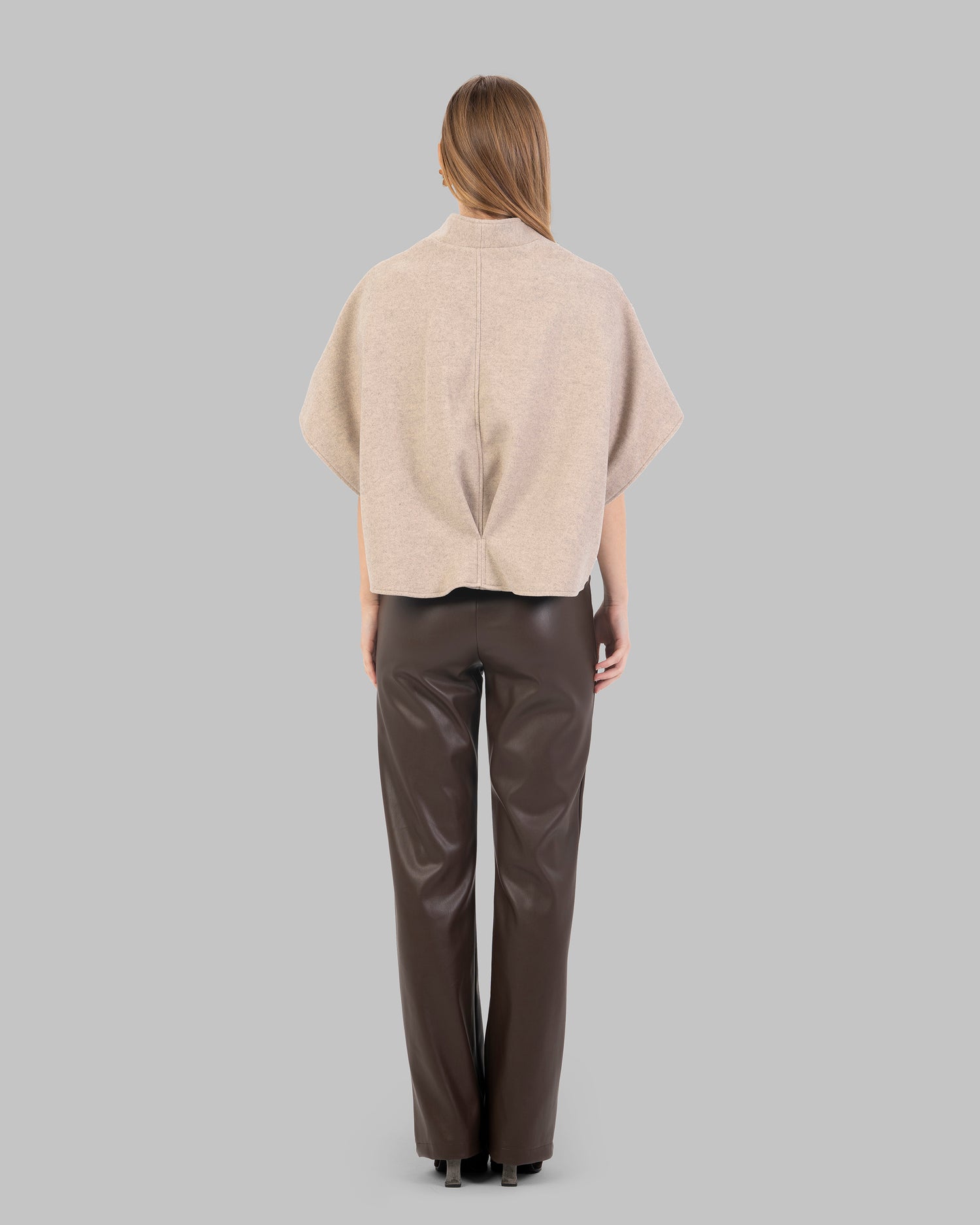 "Short Wool-Blend Cape Jacket  With Patch pocket."