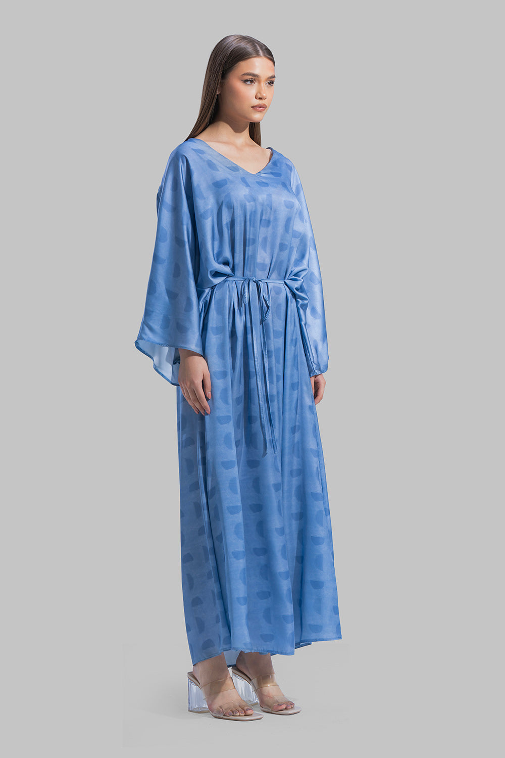 Oversized maxi dress featuring a V-neckline and wide kimono-style sleeves.