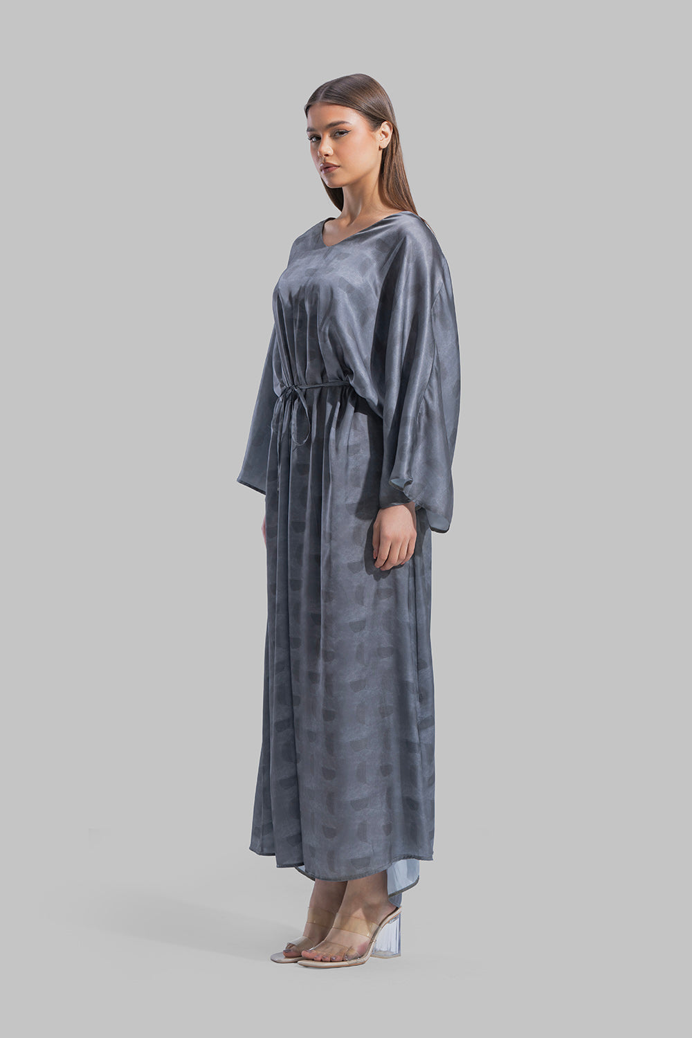 Oversized maxi dress featuring a V-neckline and wide kimono-style sleeves.