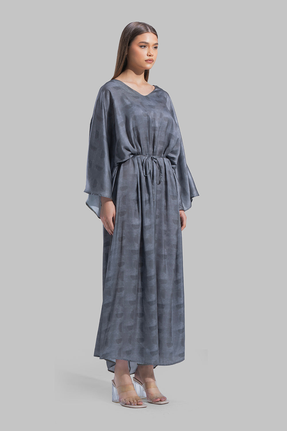 Oversized maxi dress featuring a V-neckline and wide kimono-style sleeves.