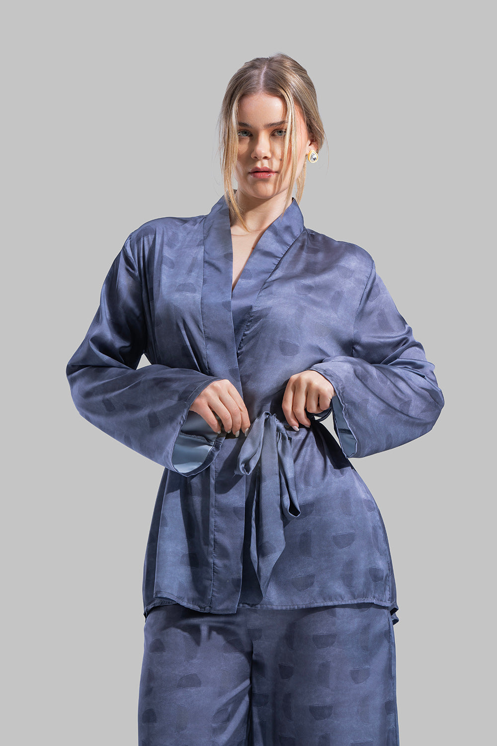 Long sleeve Cardigan with a wrap-style front.