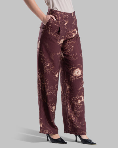 High-waisted wide-leg trousers featuring an all-over floral print.