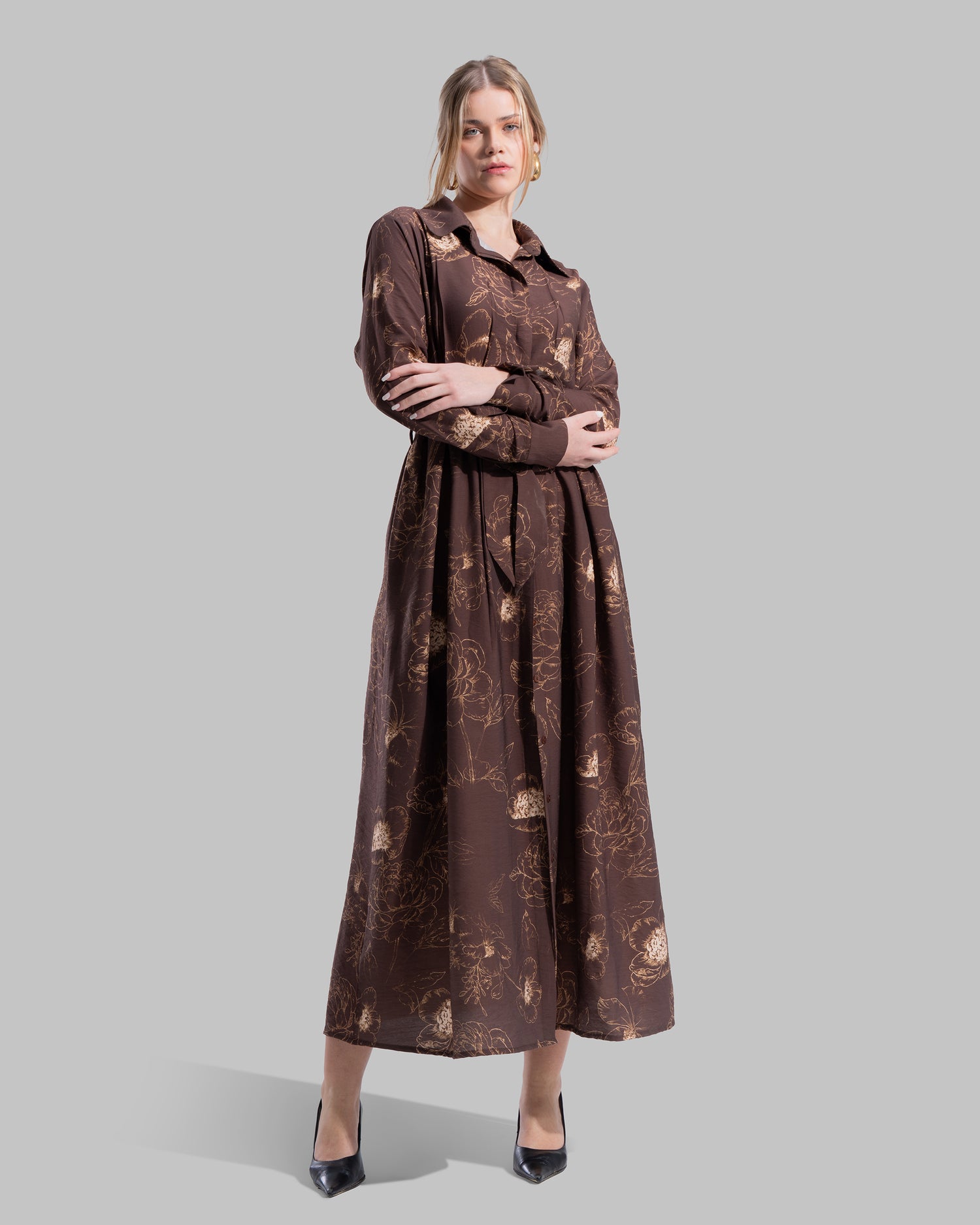 Floral print midi shirt dress with a matching tie belt at the waist.