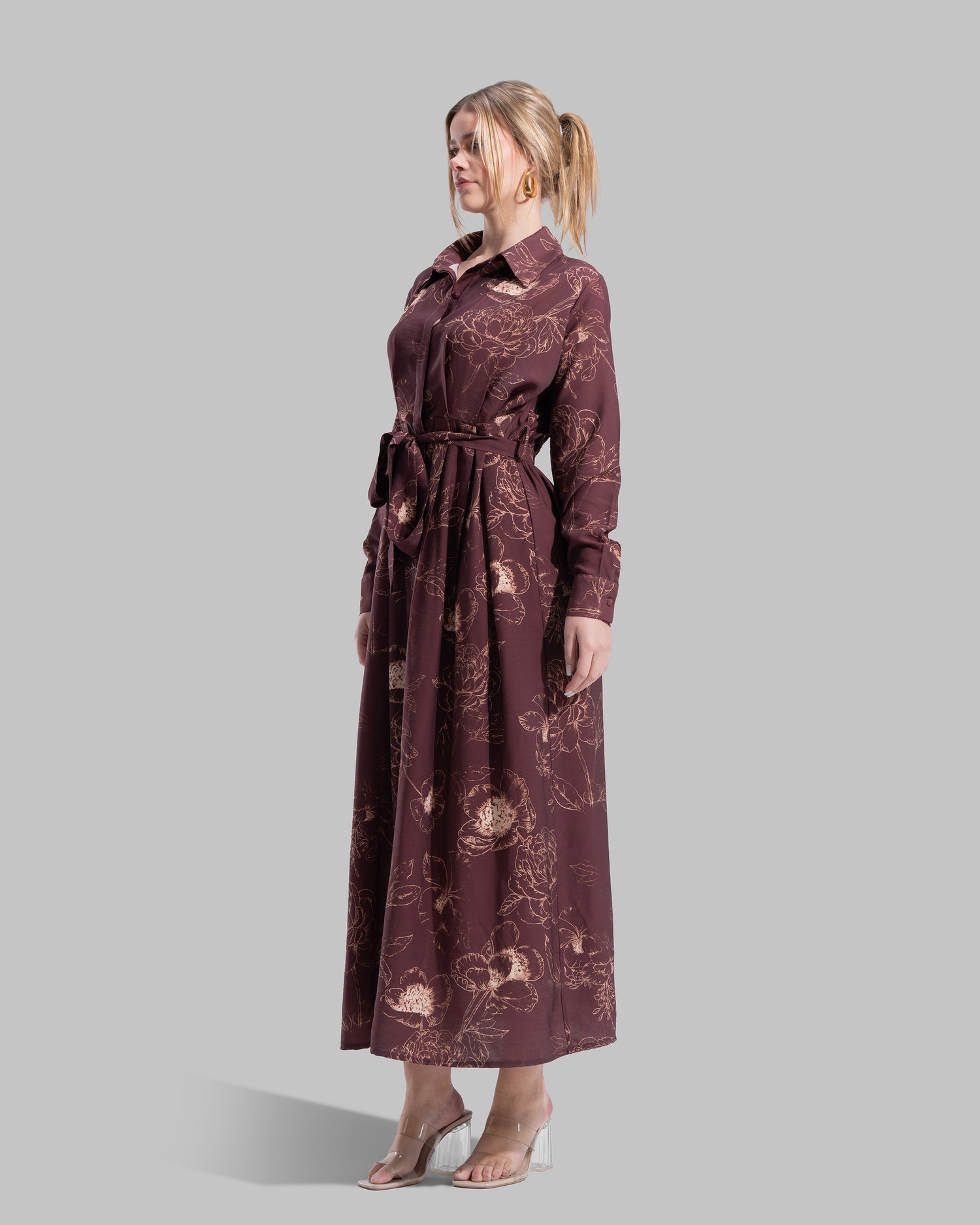 Floral print midi shirt dress with a matching tie belt at the waist.