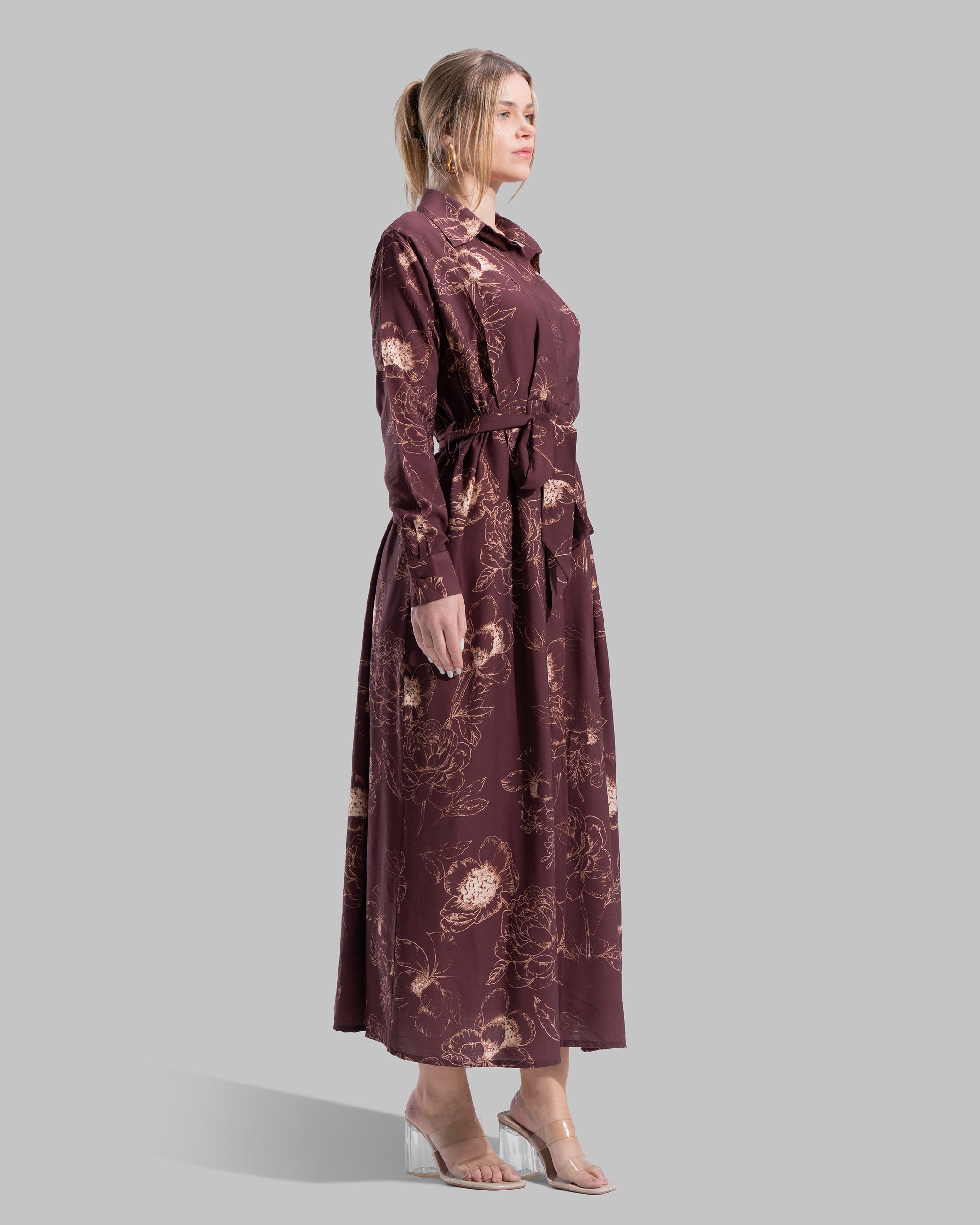 Floral print midi shirt dress with a matching tie belt at the waist.