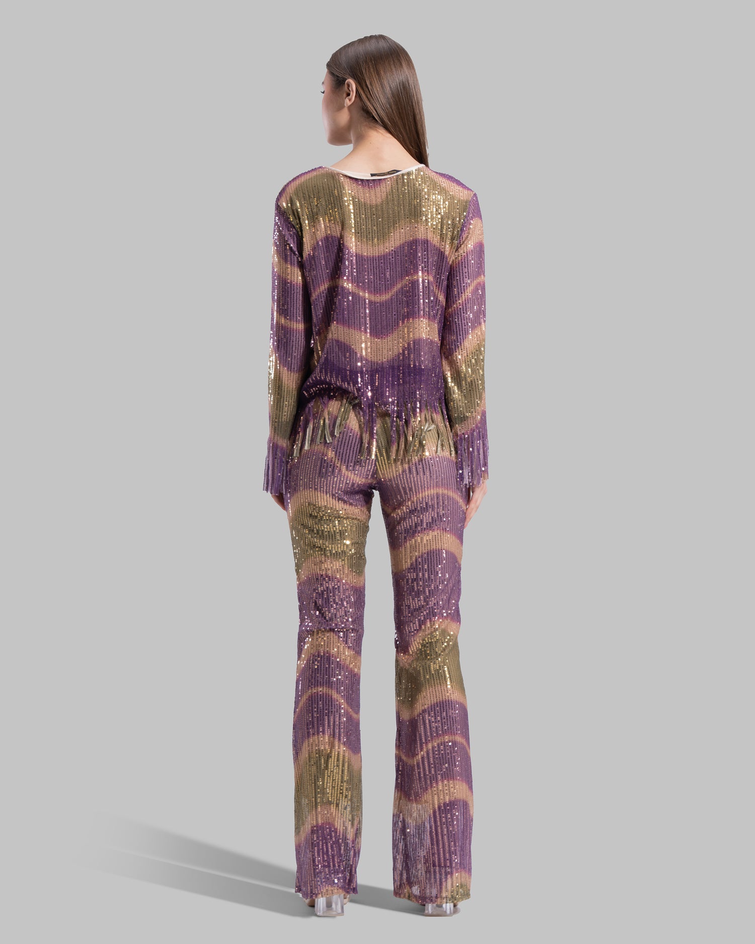 High-waisted Flared Leg trousers with an elastic waistband.