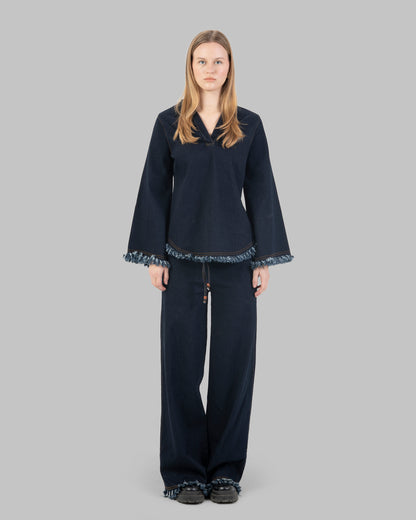 بنطلون جينز واسع الساق