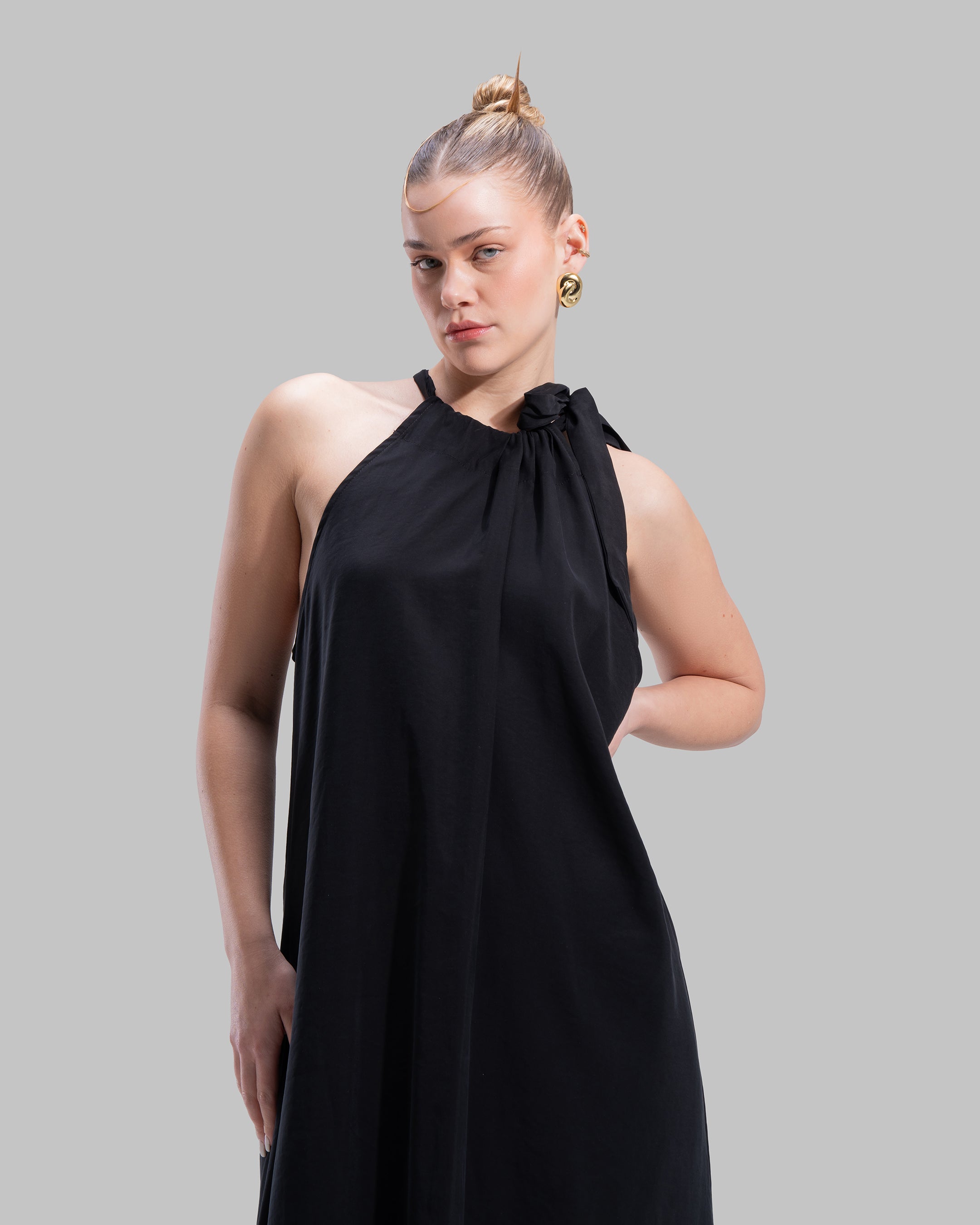 Long dress with a halter neckline.