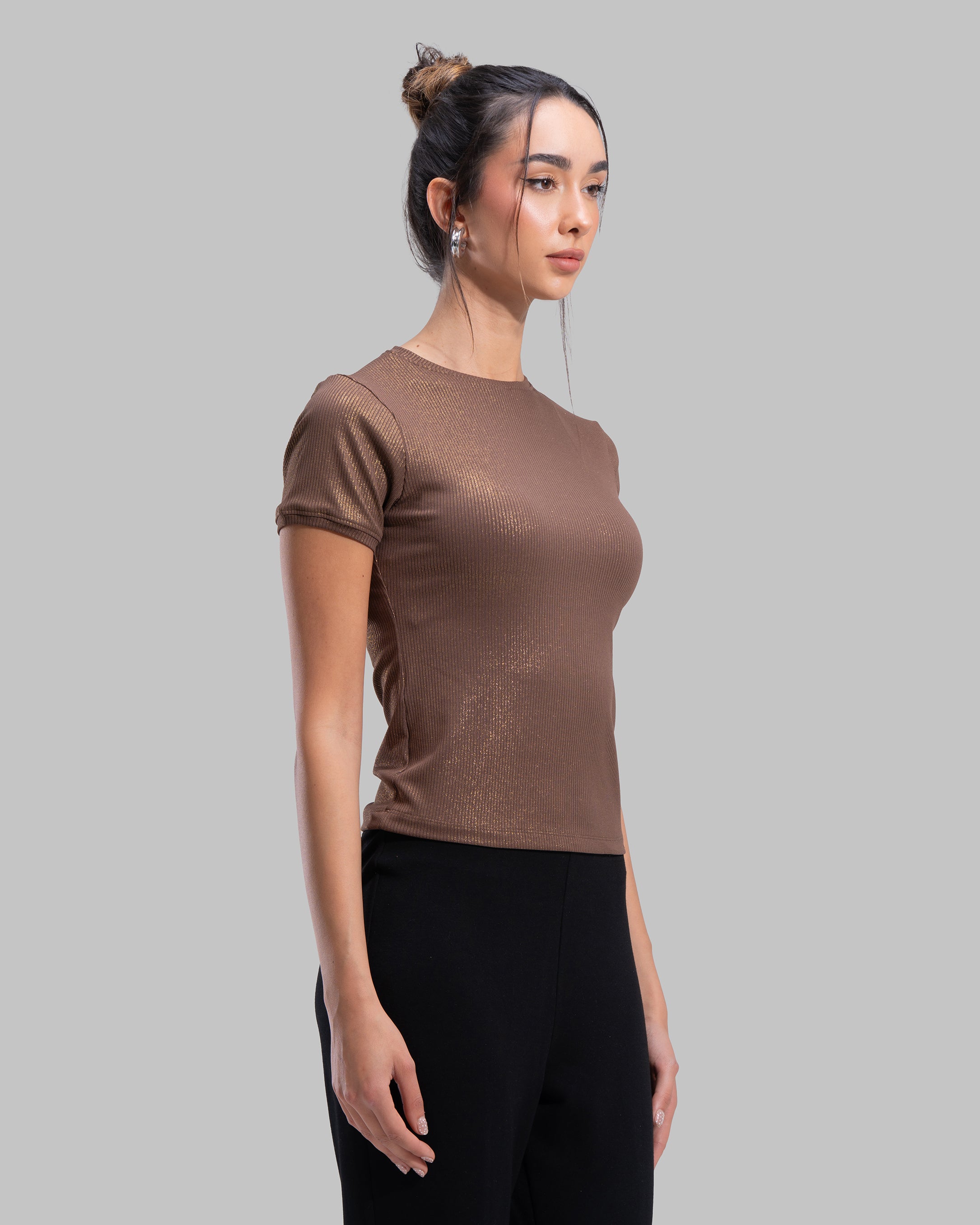 Short sleeve ribbed top with a shimmering metallic finish and round neck.
