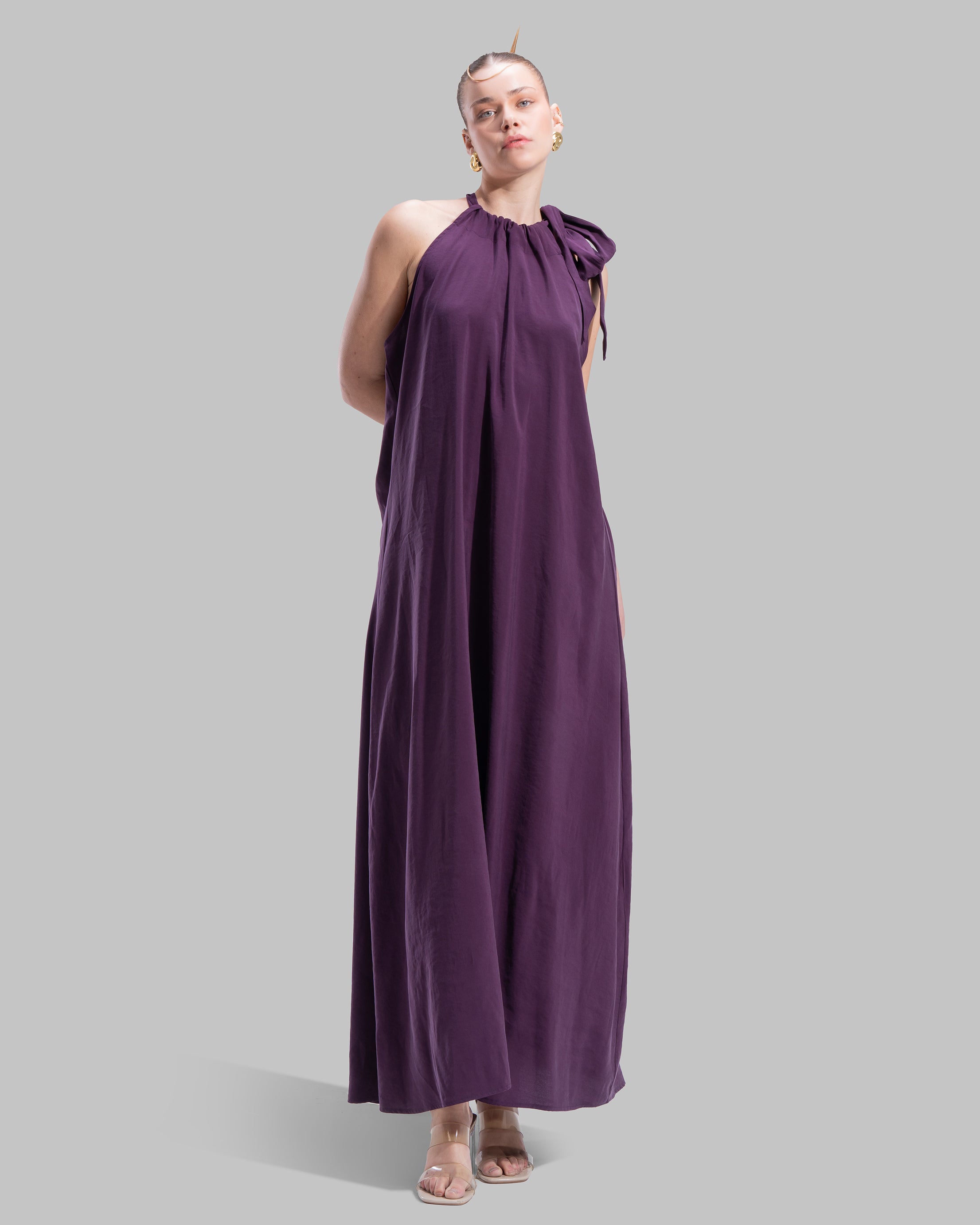 Long dress with a halter neckline.