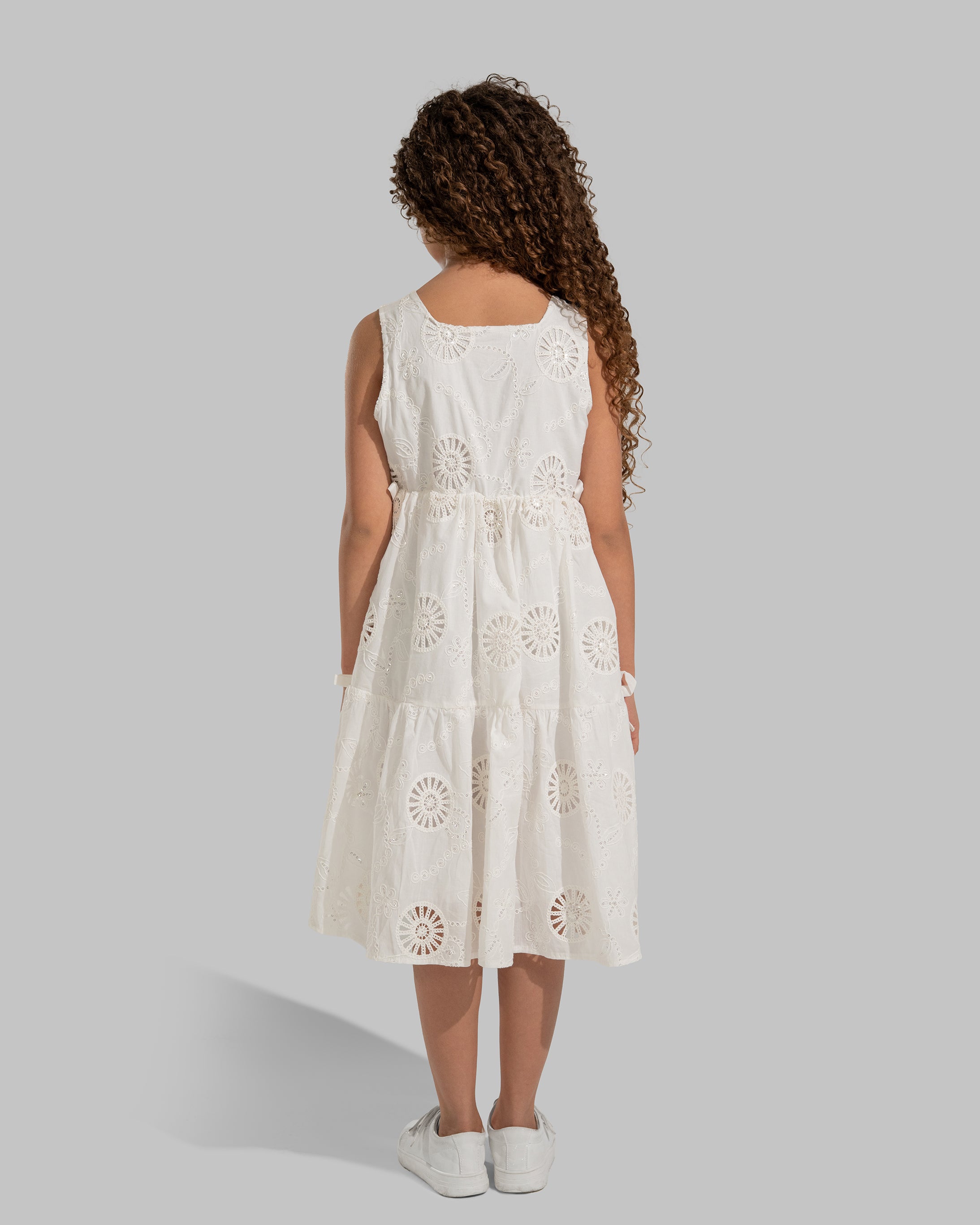 White eyelet midi dress with delicate bow details