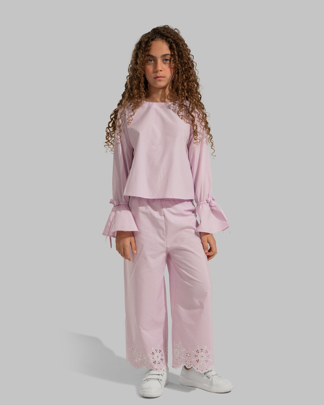 Striped straight-leg trousers with embroidered hems