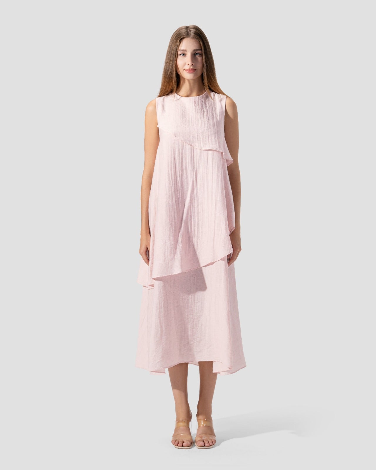 midi dress. round neck and sleeveless with ruffeld hem