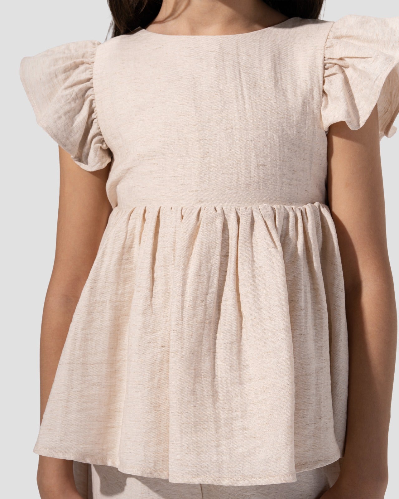 Ruffled top with V-neck