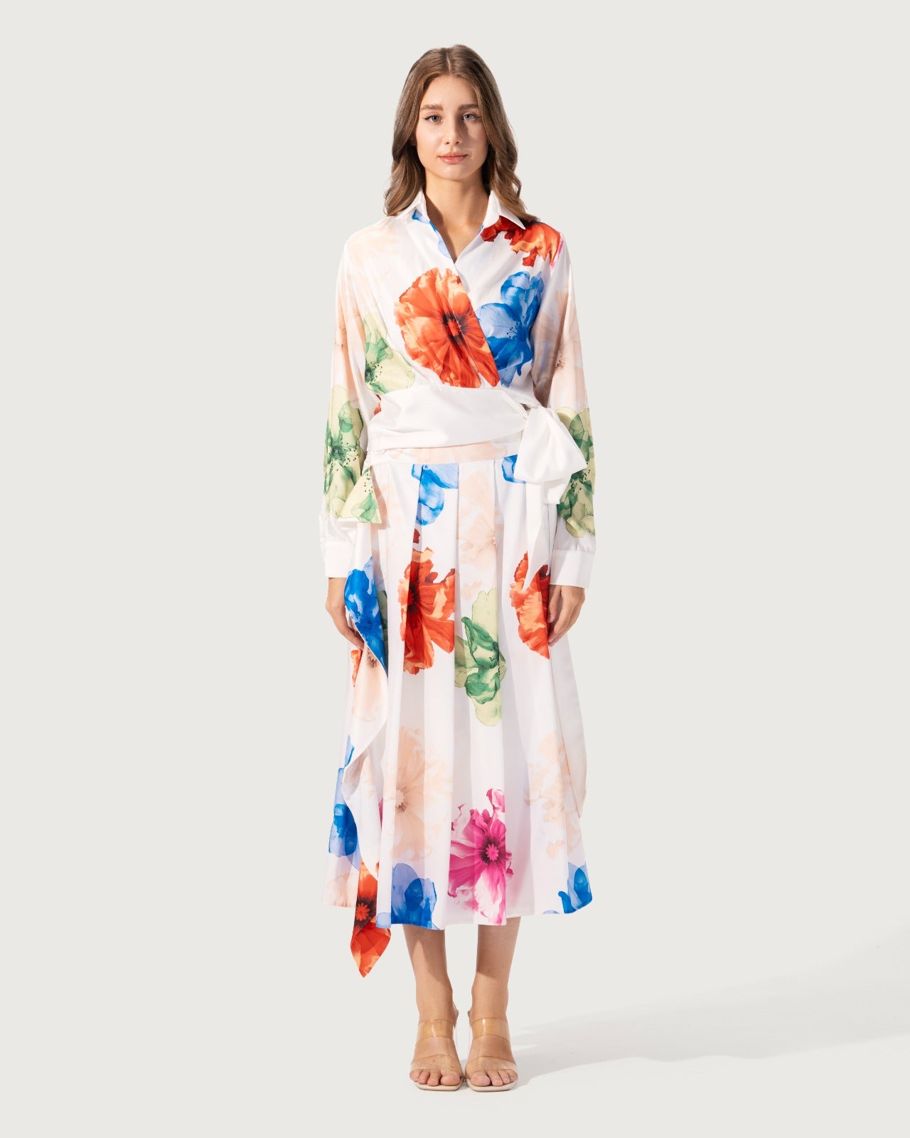 Pleated midi skirt crafted , featuring an all-over watercolor floral print