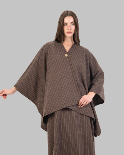 pinstripe poncho with a V-neck and an asymmetric hem.